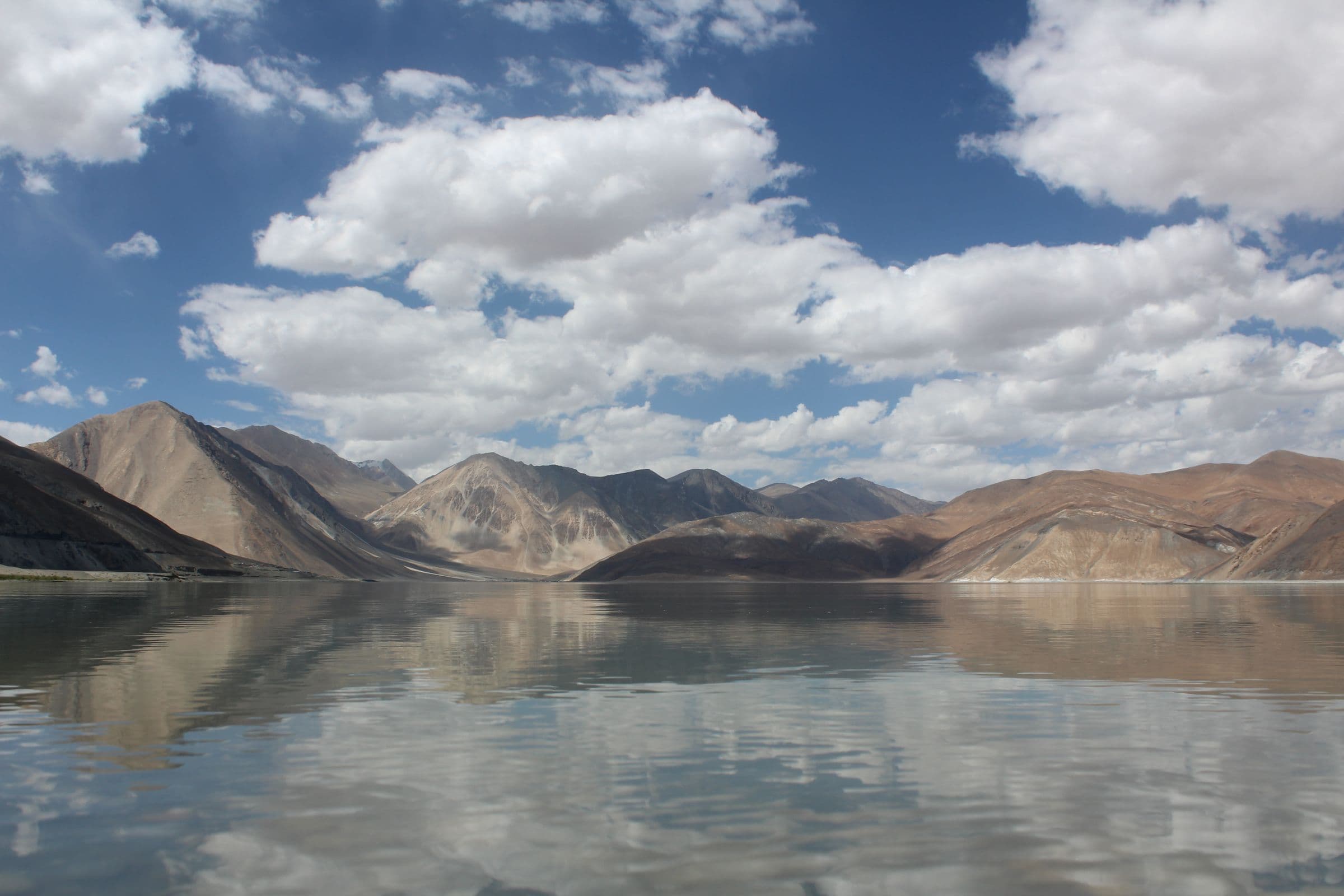 Chandratal lake ringed by bare mountains